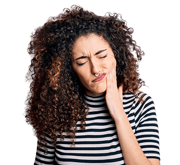 Woman in need of Emergency Dental Care